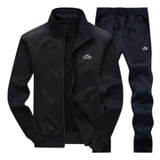 Heren oversized joggingpak set met rits, opstaande kraag en lange broek. Gemaakt van katoen-polyester mix voor comfort en warmte in de herfst en winter.