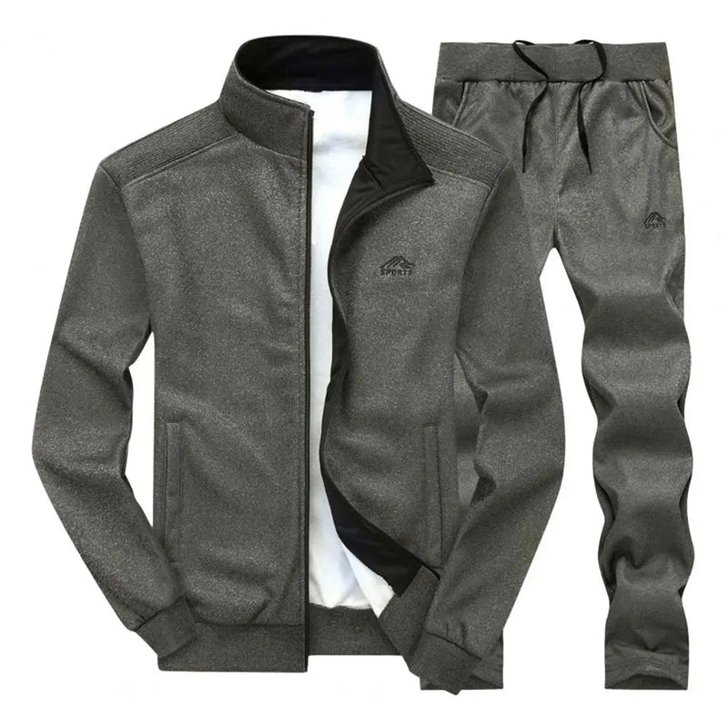 Heren oversized joggingpak set met rits, opstaande kraag en lange broek. Gemaakt van katoen-polyester mix voor comfort en warmte in de herfst en winter.